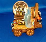 Rare Pinocchio music snow globe wagon