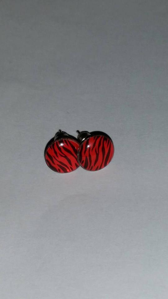 Red swirl stud earrings