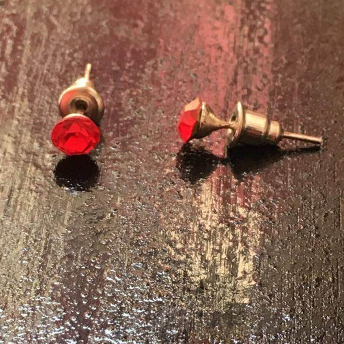 Red studded earrings
