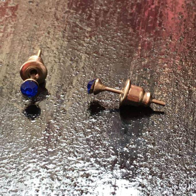 Dark blue studded earrings